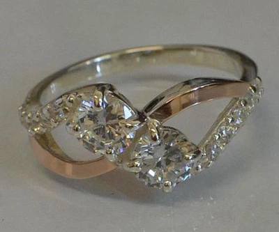 Кільце срібне 925 проби золота 375 проби білий 19 розмір 3309