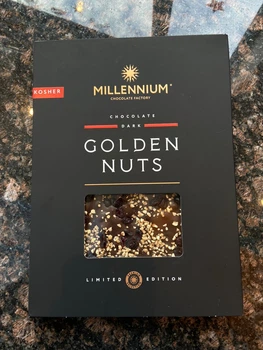 Шоколад черный с фундуком,миндалем и клюквой 1,1 кг Millennium