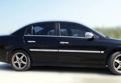 Нержавеющая наружная окантовка стекол Carmos для Opel Vectra C (2002-2008) - 4 шт, нержавейка