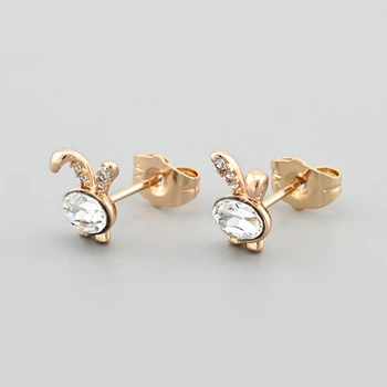 Сережки гвоздики з кристалами Swarovski Зайчик 43727 розмір 10х8 мм колір білий вага 1.6 г позолота 18К