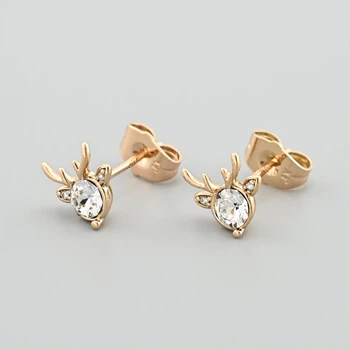 Сережки гвоздики з кристалами Swarovski Оленя Бембі 43607 розмір 9х9 мм колір білий вага 1.4 г позолота 18К