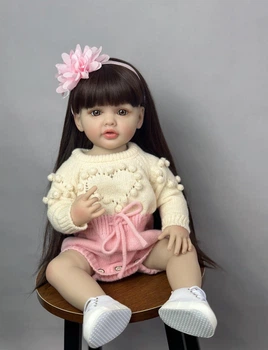 Велика вінілова лялька ручної роботи з квіткою Reborn Baby Doll зі справжнім волоссям та красивими очима.
