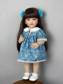 Велика вінілова лялька ручної роботи в сукні Reborn Baby Doll зі справжнім волоссям і красивими очима.