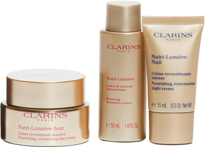 Zestaw do pielęgnacji twarzy Clarins Nutri-Lumiere Value Krem na dzień 50 ml + Krem na noc 15 ml + Lotion oczyszczający 50 ml (3666057144479)
