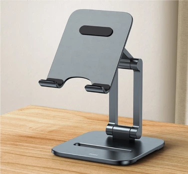 Стандартний пристрій для телефону або планшета Baseus LUSZ000013 Desktop Biaxial Foldable Metal Stand (for Phones) у сірому кольорі, складний та зроблений з металу.