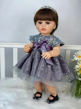 Музична вінілова лялька ручної роботи Reborn Doll у ошатному фіолетовому платті (музичний чіп, видає звуки)