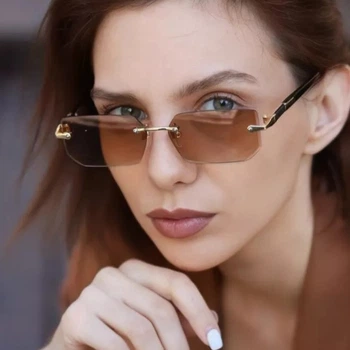 Сонцезахисні окуляри No Brand унісекс без оправи Trend коричневі із золотом