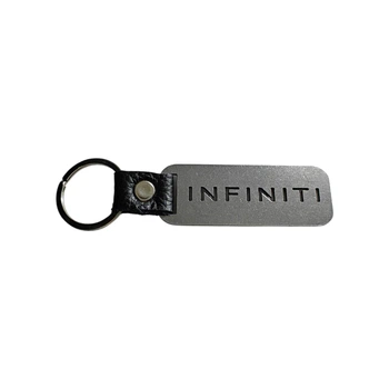 Брелок з металу та назвою марки Infiniti