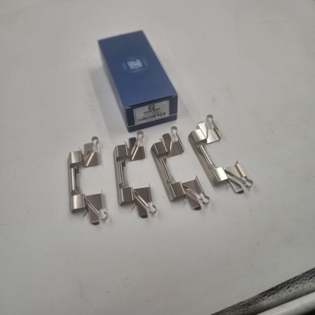 Комплект пружинок кріплення колодок Q-FIX Q094-0597 4605A195 L200, Л200, PAJERO SPORT, Паджеро Спорт 4605A195.