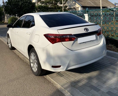 Спойлер LIP (Sunplex, черный) (118см*6,4см) для Toyota Corolla 2013-2019 гг