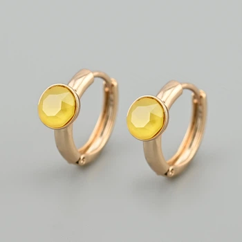 Сережки з кристалами Swarovski 53416 розмір 14х7 мм колір жовтий опал вага 3.0 г позолота 18К