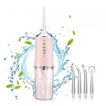 Електричний портативний іригатор ротової порожнини "Portable Oral Irrigator" KRD-1948 рожевий