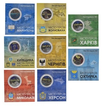 Набір медалейУкраїна набір з 8 пам’ятних медалей 2022–2023 UNC Міста-герої у сувенірній упаковці Кольорові
