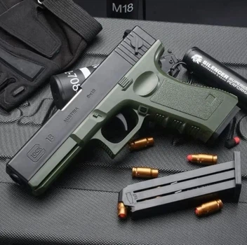 Дитячий Пістолет Glock 18C на кульках з гільзами та Глушником Зелений
