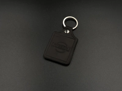 Брелок автомобильный Nissan кожаный с кольцом для ключей 43х65 мм Черный (BRH-018)