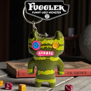 Пластиковый брелок Фуглер Fuggler Funny Ugly Monster (зелёный монстр с жёлтыми полосами) 7 см (Zuru, коллекционный)