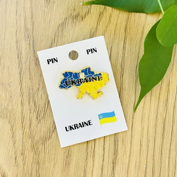 Значок пин карта Украины желто-голубая с трезубом и надписью UKRAINE, крепление бабочка