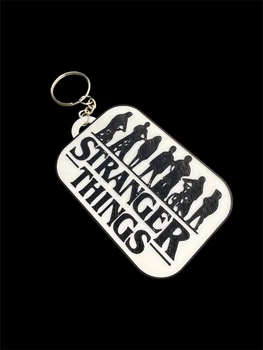 Брелок на ключі або рюкзак із серіалу Stranger Things білий з чорним