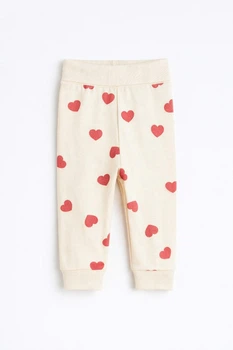 Штани H&M 1134422 56см молочний сердечки