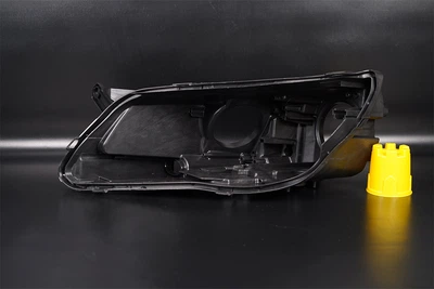 Корпус фари VW Volkswagen Tiguan Xenon (2006-2011) дорест лівий Lemarix (B51-7647-1)