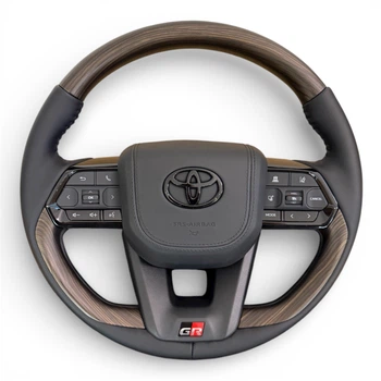 Руль для Toyota Land Cruiser 200, Prado 150. GR. В стиле LC300. С подогревом. Коричневое дерево. Подушка из кожи - черный логотип. В сборе.
