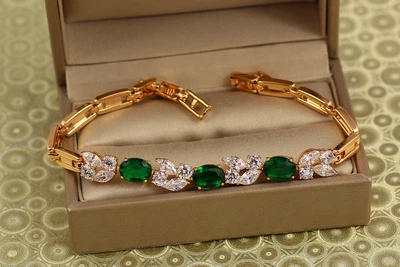 Браслет Xuping Jewelry Звездопад с зелеными камнями 19,5 см золотистый