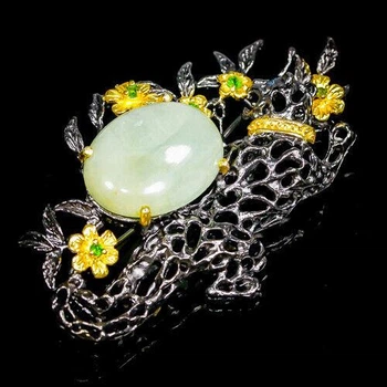Серебряная брошь Аквамарин (87520)