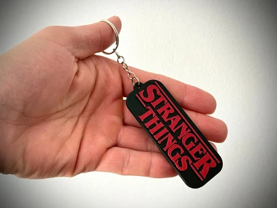 Брелок для ключів у вигляді логотипу серіалу Дивні дива Stranger Things. Aivory