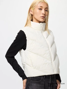 Теплий жилет жіночий UNIQLO 956211477 L Молочний (1159859660)