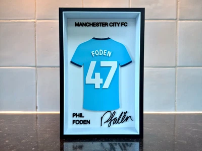 Картина в рамці футболка Manchester City FC Phil Foden 47 з автографом. Aivory