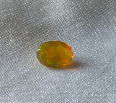 Эфиопский опал 1Ct 9.00 X 6.77 X 4.79 MM (386083)