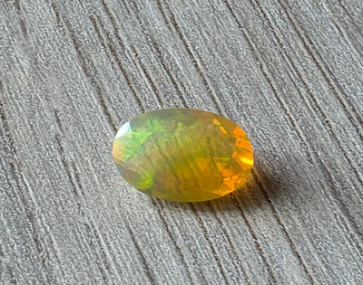 Эфиопский опал 1.22 Ct 10.29 X 7.00 X 4.39 MM (3619)