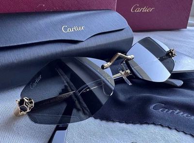 Солнцезащитные очки безоправные черные с золотой оправой ( версия Cartier)