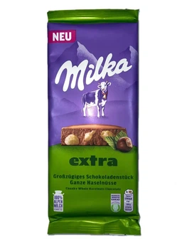 Шоколад плитка Milka Extra Chunky Whole hazelnuts Ganze Haselnüsse Мілка Екстра Молочний з цільними лісовими горіхами 190г
