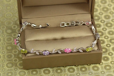 Браслет Xuping Jewelry Веточка с разноцветными камнями 21 см 4 мм серебристый