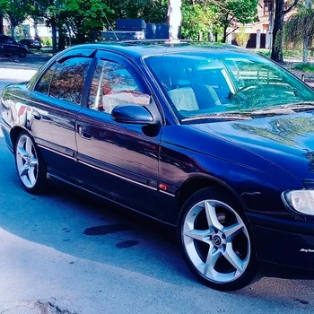 Дефлекторы окон VL-Tuning на Opel Omega B 94-03 седан (накладные)