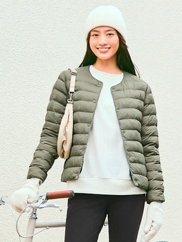 Куртка демісезонна коротка двостороння жіноча Uniqlo 919340077 XS Зелена (1159864363)