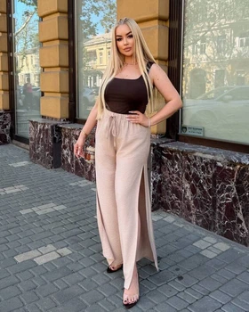 Брюки женские льняные палаццо свободного широкого кроя с высокой посадкой эластичным поясом завязками и высокими боковыми разрезами больших размеров G&M k-130976 54-56 Размер цвет бежевый