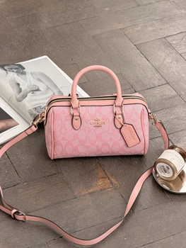 Женская сумка Coach Mini Rowan Crossbody In Signature розовая