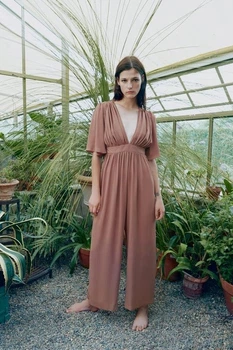 Комбінезон довгий з глибоким V-подібним вирізом бежевий Zara розмір S