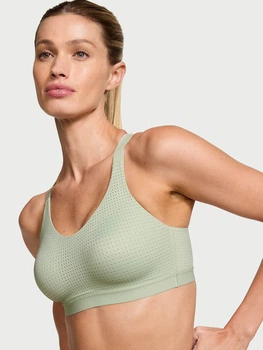 Спортивний топ Victoria's Secret VSX з перфорацією 1160936116 (Зелений 36D) — Уцінка