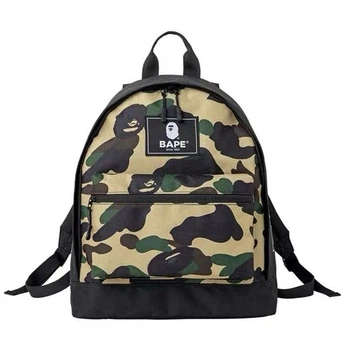Рюкзак Bape Camo e-MOOK, A Bathing Ape в камуфляжном цвете с логотипами по бокам.