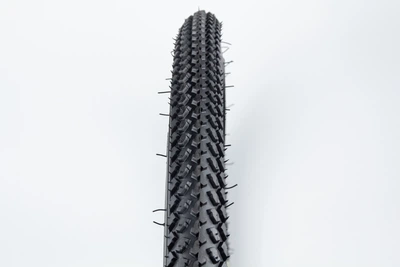 Шина 28"х1,75 (47-622) шипована SX8605