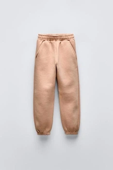 Спортивні штани джогери для дівчинки Zara бежевий 134 бавовняний трикотаж на флісі
