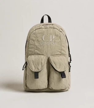 Рюкзак C.P. Company Taylon P Nylon Backpack с вышитым логотипом бежевого цвета.