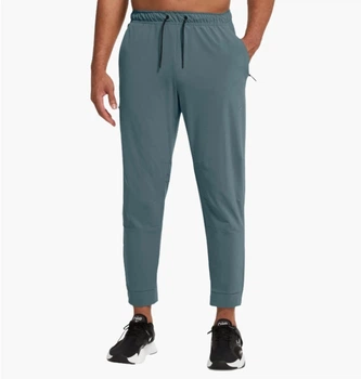 Брюки чоловічі Nike Unlimited Grey L Сірий FB7548-006