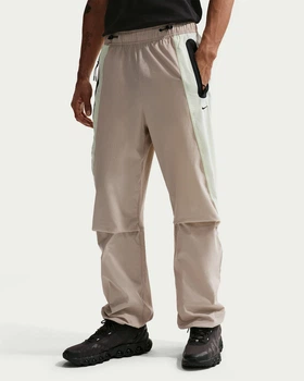 Брюки чоловічі Nike Tech Men's Dri-Fit Woven M Сірий IU7502-236