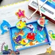 Дерев'яна магнітна гра 28538 "WToys" Рибалка 12 елементів, 2 вудочки - зображення 1