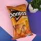 Кукурудзяні чіпси Doritos зі смаком сиру 100 г - зображення 1