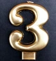 Свечи - цифры в торт "3", высота - 8 см, цвет - золото - изображение 1